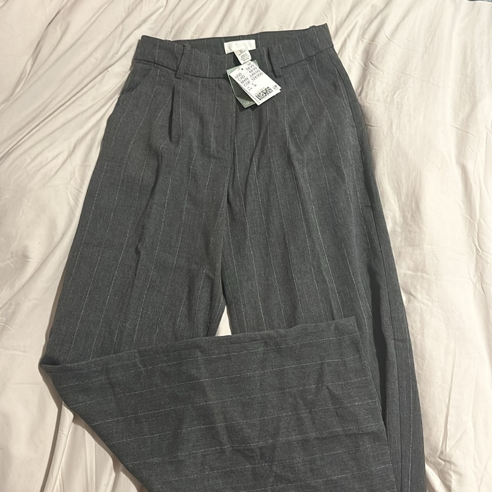 Cute H&M striped work pants. Grey with white pin stripes. Never worn with tags!!
